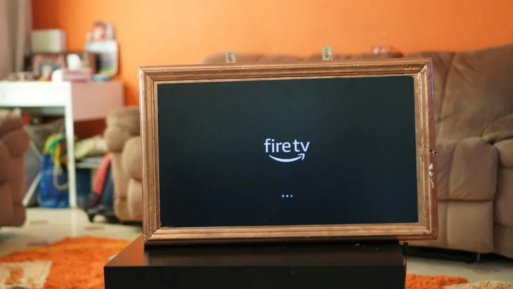 Fire TV logo on a TV screen as a Firestick 4K starts up for the first time