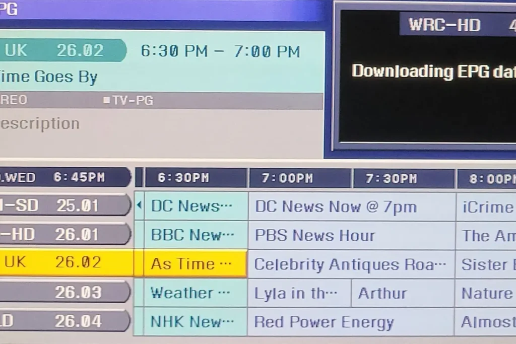 Grid-style TV programme guide with channels listed down the side and programme times across the top