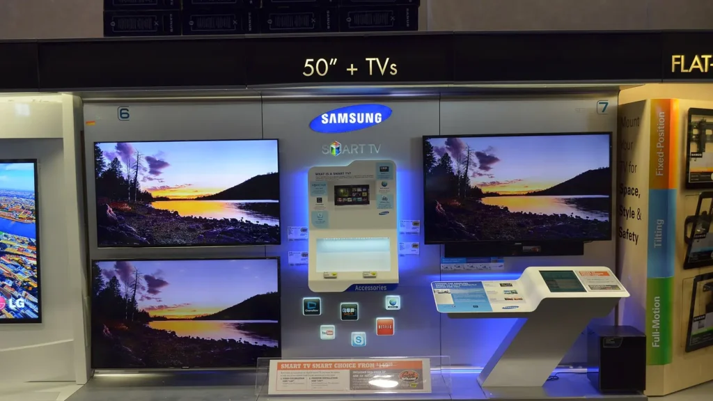 Samsung Smart TV display wall in a shop, with several Samsung televisions showing the same landscape
