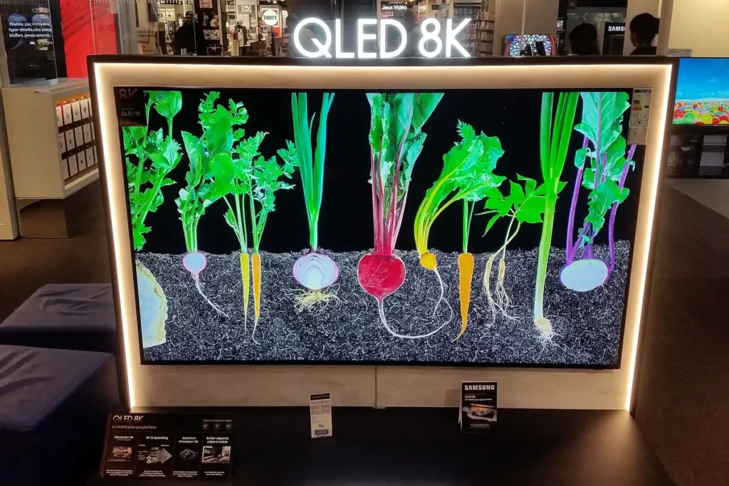 Large Samsung QLED television on display in a shop, a reminder that model year decides how long IPTV on Samsung TV apps stay supported